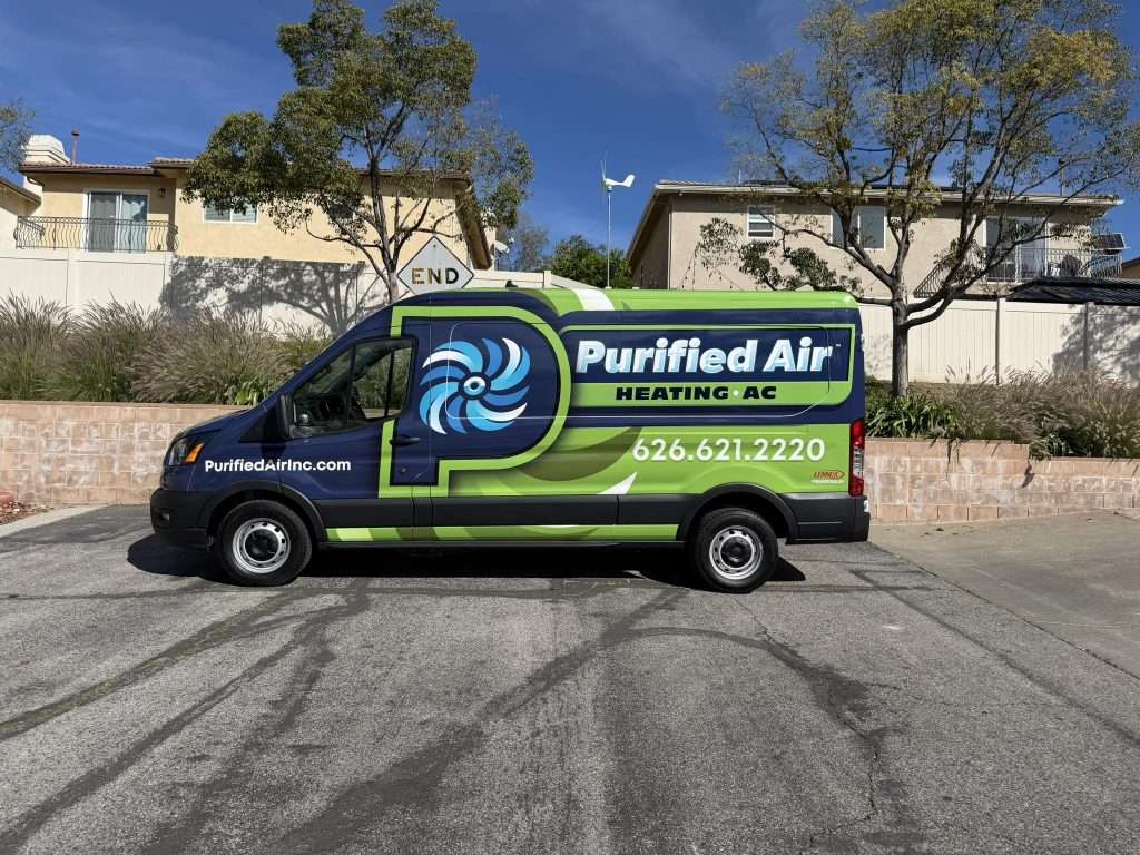 The Purified Air Heating and AC service van parked outside a customer's home